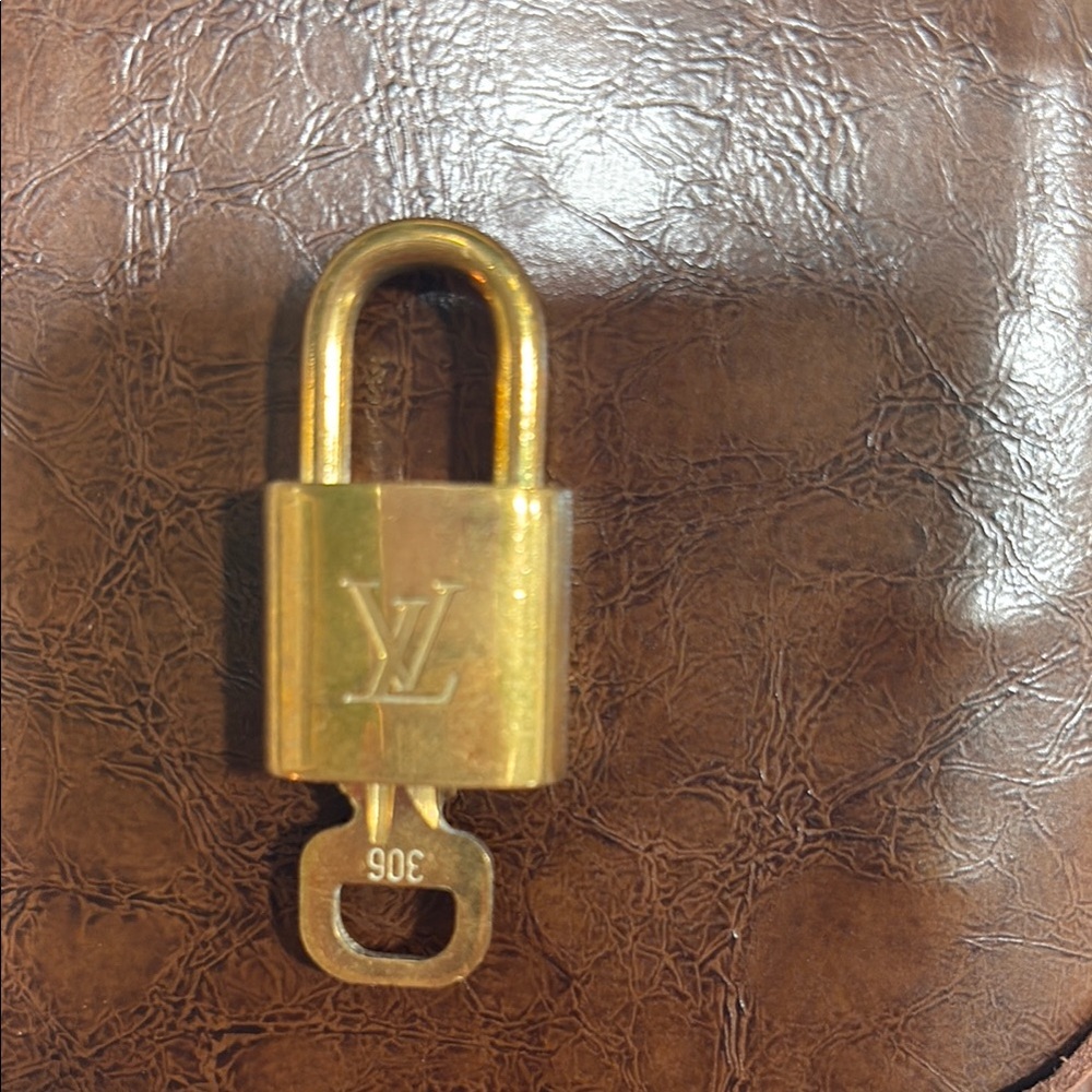 Louis Vuitton Gold Tone Lock